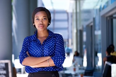 Dark-skinned woman in blue blouse