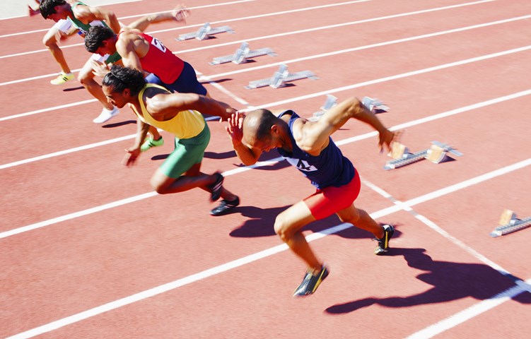 Runners on running track