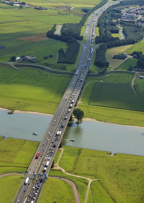 Long highway through green area