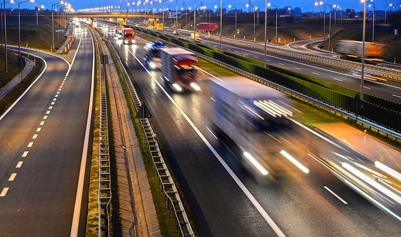 Cars drive on the highway