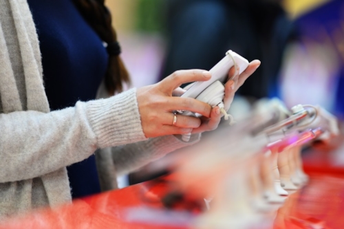 Woman buys consumer product
